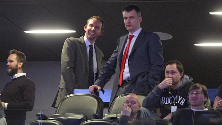 Feb 19, 2016; Brooklyn, NY, USA; Brooklyn Nets new general manager Sean Marks (left) in a suite with team owner Mikhail Prokhorov during the first quarter against the New York Knicks at Barclays Center. Mandatory Credit: Brad Penner-Imagn Images