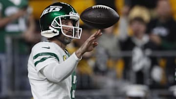 Oct 20, 2024; Pittsburgh, Pennsylvania, USA;  New York Jets quarterback Aaron Rodgers (8) warms up before the game against the Pittsburgh Steelers at Acrisure Stadium. Mandatory Credit: Charles LeClaire-Imagn Images