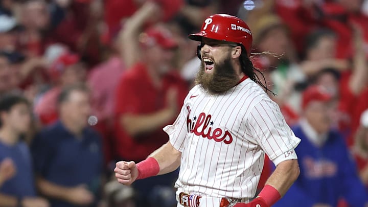 Oct 4, 2025; Philadelphia, Pennsylvania, USA; Philadelphia Phillies center fielder Brandon Marsh (16) runs to score against the Los Angeles Dodgers in the second inning during game one of the NLDS round for the 2025 MLB playoffs at Citizens Bank Park.