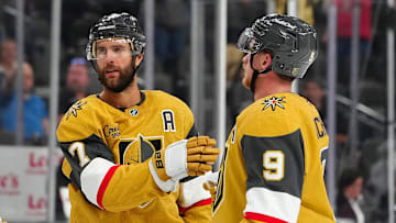 Sep 27, 2024; Las Vegas, Nevada, USA; Vegas Golden Knights defenseman Alex Pietrangelo (7) celebrates with Vegas Golden Knights center Jack Eichel (9) after scoring a goal against the Utah Hockey Club during the second period at T-Mobile Arena. Mandatory Credit: Stephen R. Sylvanie-Imagn Images