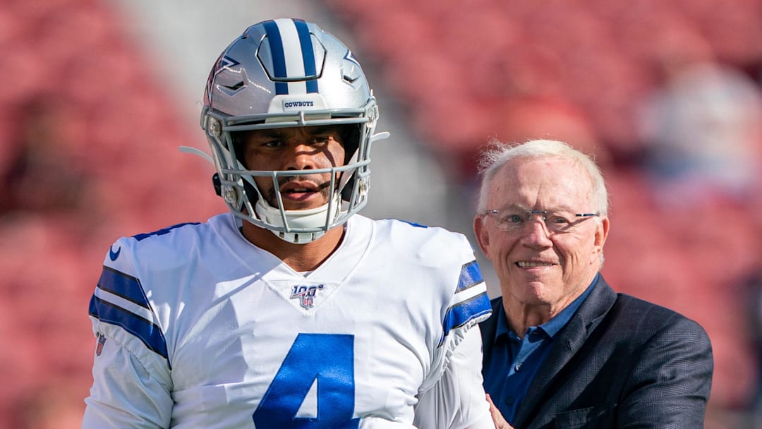 Dallas Cowboys quarterback Dak Prescott with team owner Jerry Jones before a 2019 game.