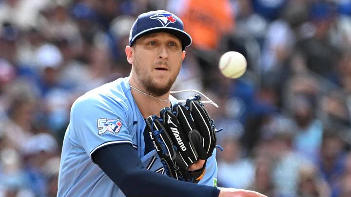 Jun 6, 2026; Toronto, Ontario, CAN;  Toronto Blue Jays relief pitcher Jeff Hoffman (23) throws to first base in an attempt to pick off a Baltimore Orioles baserunner in the sixth inning at Rogers Centre. Mandatory Credit: Dan Hamilton-Imagn Images