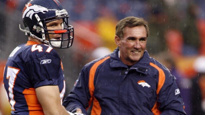 Oct 9, 2006; Denver, CO, USA; Denver Broncos safety (47) John Lynch talks with head coach Mike Shanahan prior to game against the Baltimore Ravens at Invesco Field at Mile High. 