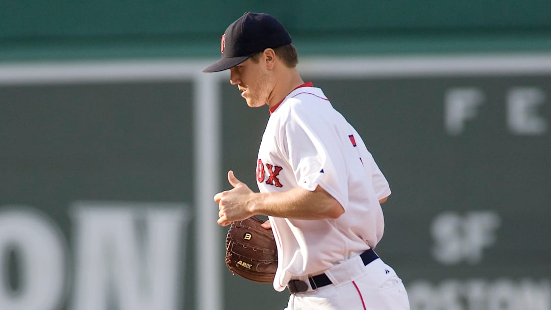 Boston Red Sox closer Jonathan Papelbon jogs out to the mound in the ninth inning at Fenway Park.
