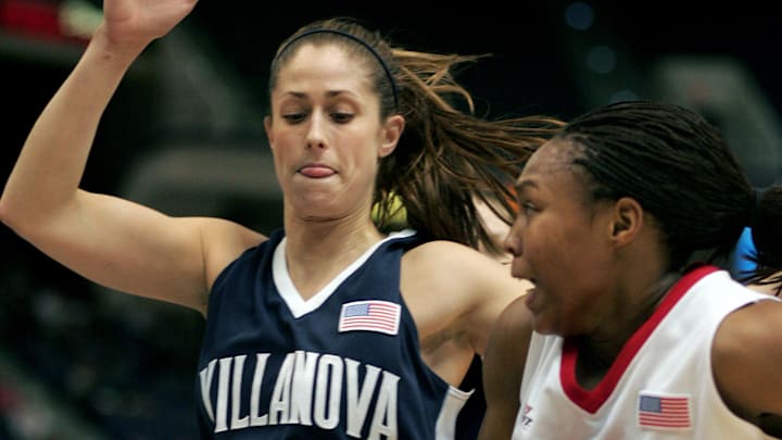 March 5, 2006; Hartford, CT, USA; Rutgers Scarlet Knights (25) Cappie Pondexter works past Villanova Wildcats (33) Jenna Viani  in the 2nd half of play at the Civic Center. Mandatory Credit: David Butler II-Imagn Images Copyright © David Butler II 2006 