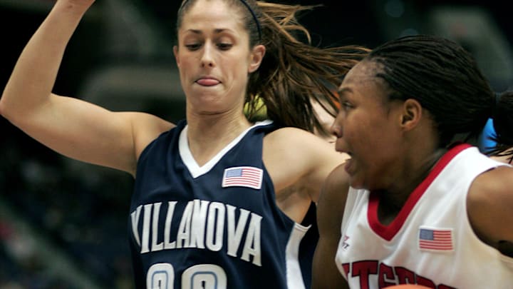 March 5, 2006; Hartford, CT, USA; Rutgers Scarlet Knights (25) Cappie Pondexter works past Villanova Wildcats (33) Jenna Viani  in the 2nd half of play at the Civic Center. Mandatory Credit: David Butler II-Imagn Images Copyright © David Butler II 2006 