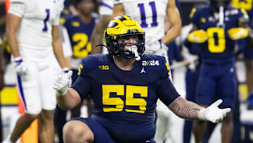 Jan 8, 2024; Houston, TX, USA; Michigan Wolverines defensive lineman Mason Graham (55) against the Washington Huskies during the 2024 College Football Playoff national championship game at NRG Stadium. Mandatory Credit: Mark J. Rebilas-Imagn Images