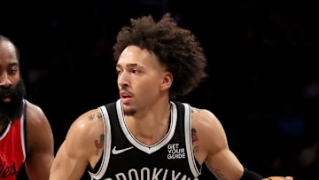 Mar 28, 2025; Brooklyn, New York, USA; Brooklyn Nets forward Jalen Wilson (22) controls the ball against Los Angeles Clippers guard James Harden (1) during the third quarter at Barclays Center. Mandatory Credit: Brad Penner-Imagn Images