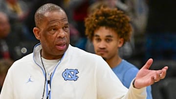 Mar 20, 2025; Milwaukee, WI, USA; North Carolina Tar Heels head coach Hubert Davis watches team workout during NCAA Tournament First Round Practice at Fiserv Forum. Mandatory Credit: Benny Sieu-Imagn Images