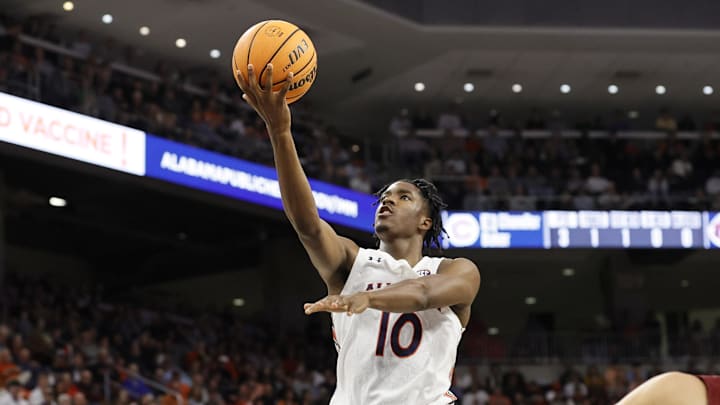 Dec 2, 2022; Auburn, Alabama, USA;  Auburn Tigers guard Chance Westry (10) goes for a shot against the Colgate Raiders during the second half at Neville Arena. Mandatory Credit: John Reed-Imagn Images