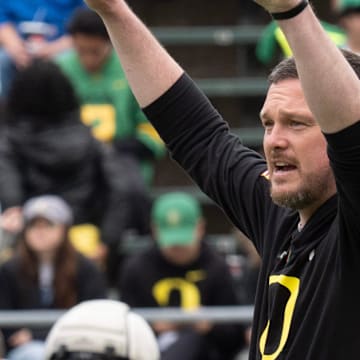 Oregon coach Dan Lanning rallies his team during warmups before the Oregon Spring game at Autzen in Eugene April 26, 2025