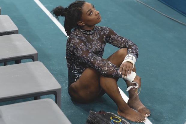 Biles calf injury 