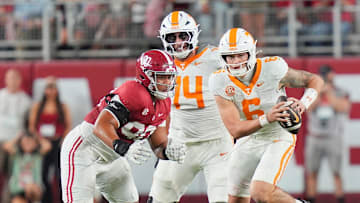 Tennessee quarterback Joey Aguilar (6) decides to run the ball during a college football game against Alabama at Bryant-Denny Stadium in Tuscaloosa, Ala., on Oct. 18, 2025.
