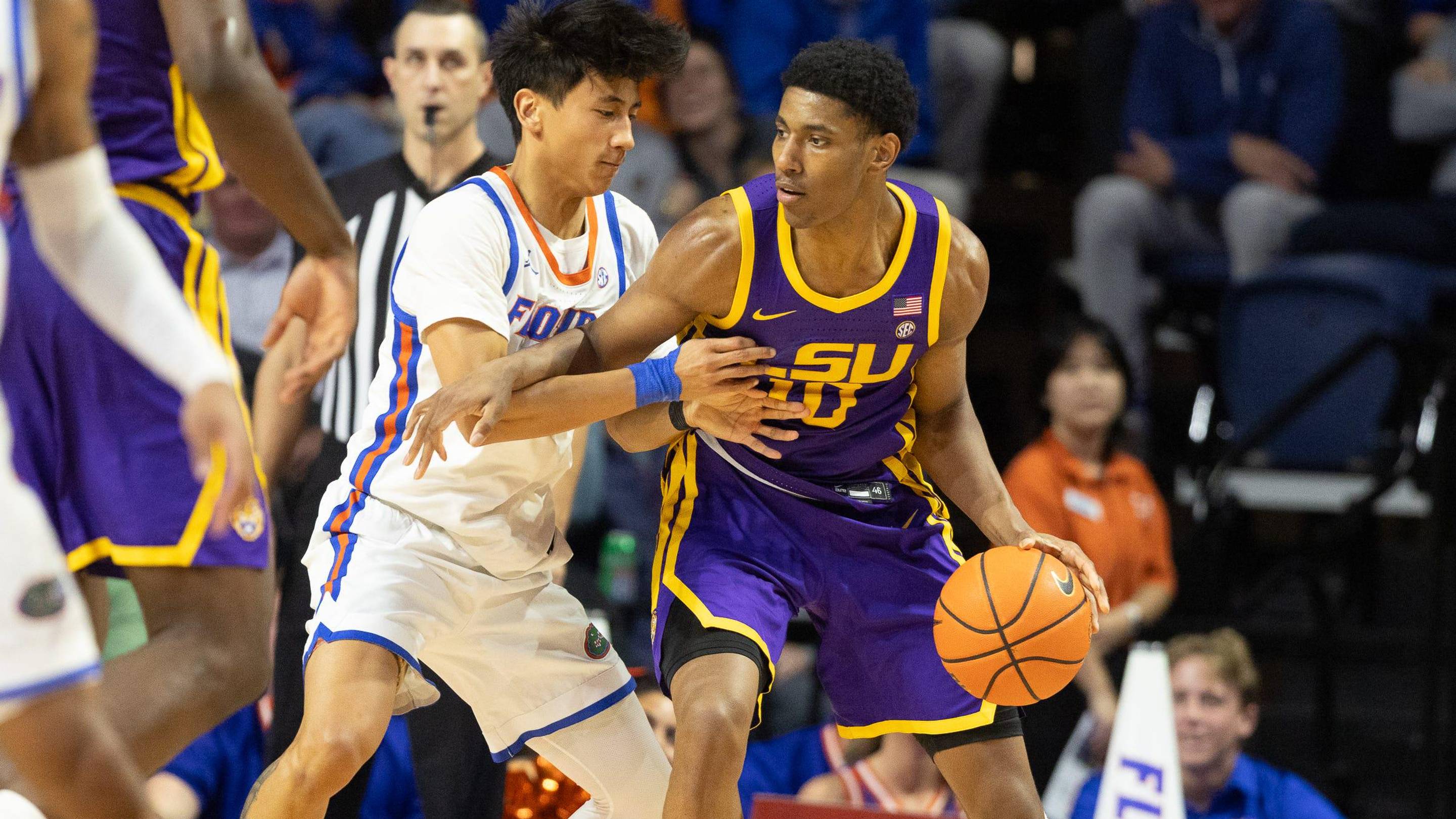 Marquel Sutton dribbles the ball against Florida in 2026