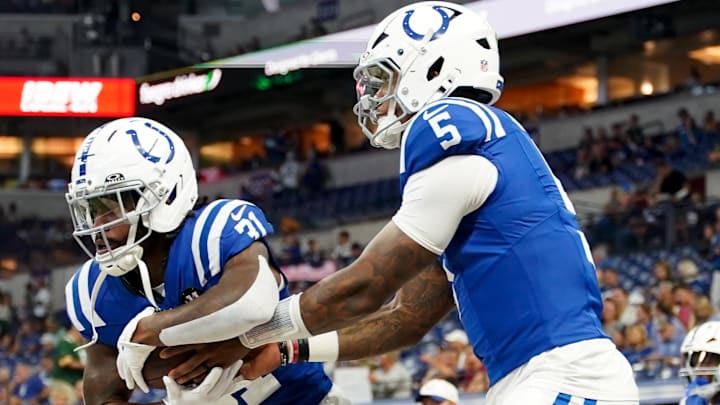 Aug 16, 2025; Indianapolis, Indiana, USA; Indianapolis Colts running back Tyler Goodson (31) receives a handoff from Indianapolis Colts quarterback Anthony Richardson Sr. (5) during warmups prior to the game against the Green Bay Packers at Lucas Oil Stadium. Mandatory Credit: Robert Goddin-Imagn Images Aug 16, 2025; Indianapolis, Indiana, USA; Indianapolis Colts running back Tyler Goodson (31) receives a handoff from Indianapolis Colts quarterback Anthony Richardson Sr. (5) during warmups prior to the game against the Green Bay Packers at Lucas Oil Stadium. Mandatory Credit: Robert Goddin-Imagn Images