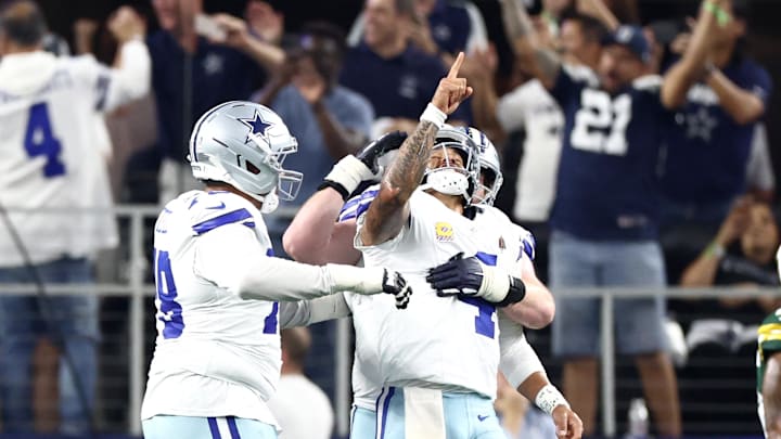 Dallas Cowboys quarterback Dak Prescott celebrates in the third quarter against the Green Bay Packers at AT&T Stadium. Dallas Cowboys quarterback Dak Prescott celebrates in the third quarter against the Green Bay Packers at AT&T Stadium.