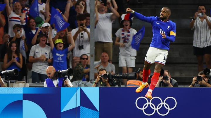 [US, Mexico & Canada customers only] Jul 24, 2024; Marseille, France; Alexandre Lacazette of France celebrates scoring their first goal against USA during a men's Group A football match during the Paris 2024 Olympic Summer Games at Orange Velodrome. Mandatory Credit: Luisa Gonzalez/Reuters via USA TODAY Sports