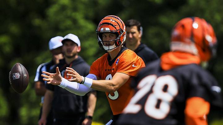 Jun 16, 2026; Cincinnati, OH, USA; Cincinnati Bengals quarterback Joe Burrow (9) snaps the ball during minicamp at Kettering Health Practice Fields. Mandatory Credit: Katie Stratman-Imagn Images