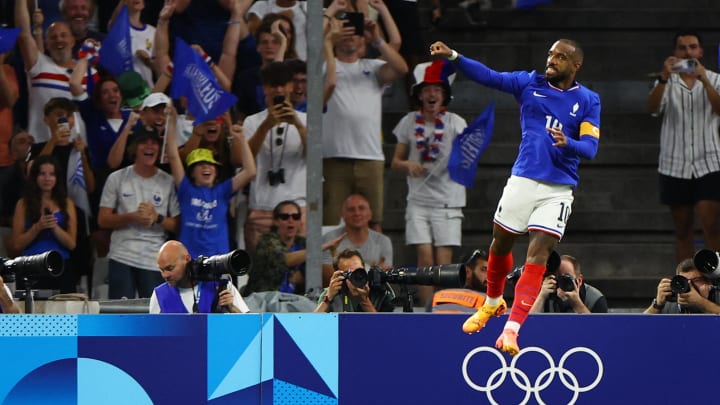 Alexandre Lacazette of France celebrates scoring their first goal against USA during a men's Group A football match during the Paris 2024 Olympic Summer Games at Orange Velodrome.