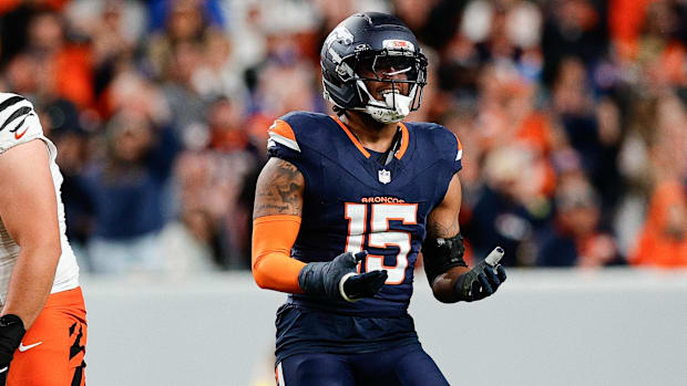 Denver Broncos linebacker Nik Bonitto (15) celebrates after sacking Cincinnati Bengals quarterback Jake Browning (6).