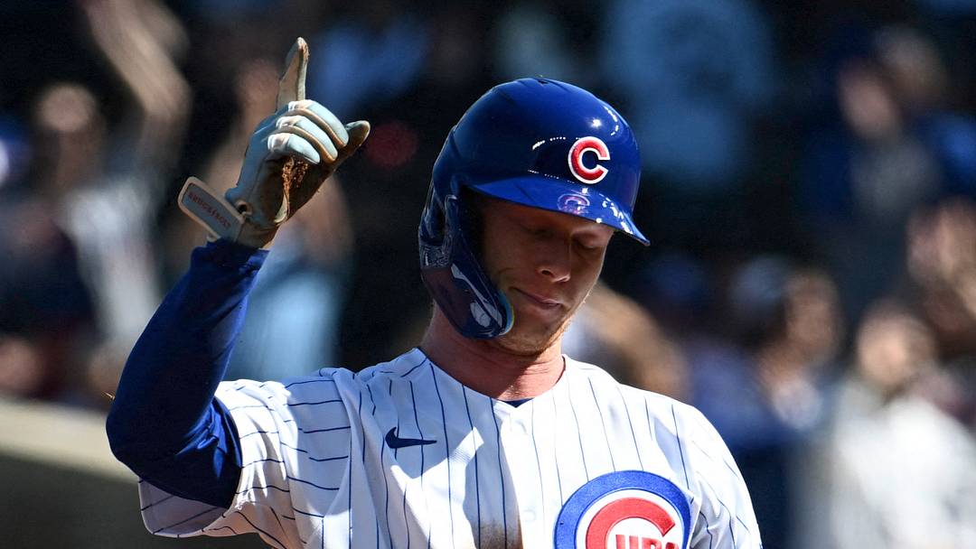 Sep 24, 2026; Chicago, Illinois, USA;  Chicago Cubs center fielder Pete Crow-Armstrong (4) acknowledges the crowd after stealing second base during the first inning against the Miami Marlins at Wrigley Field. It was his 40th stolen base.  Mandatory Credit: Matt Marton-Imagn Images