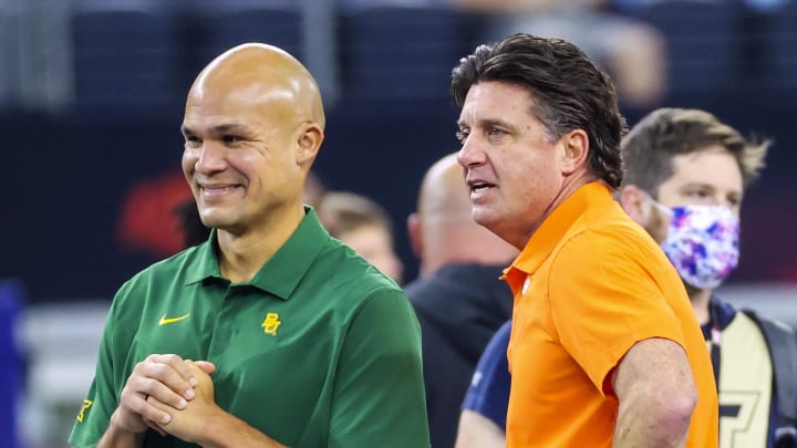 Dec 4, 2021; Arlington, TX, USA; Baylor Bears head coach Dave Aranda (left) and Oklahoma State Cowboys head coach Mike Gundy (right) speak before the Big 12 Conference championship game at AT&T Stadium. Mandatory Credit: Kevin Jairaj-USA TODAY Sports