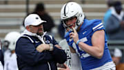 Penn State offensive coordinator Andy Kotelnicki talks to Nittany Lions quarterback Drew Allar during the spring game.