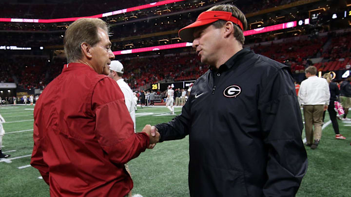 Alabama Crimson Tide head coach Nick Saban shakes hands with Georgia Bulldogs head coach Kirby Smart before the 2018 CFP national championship college football game