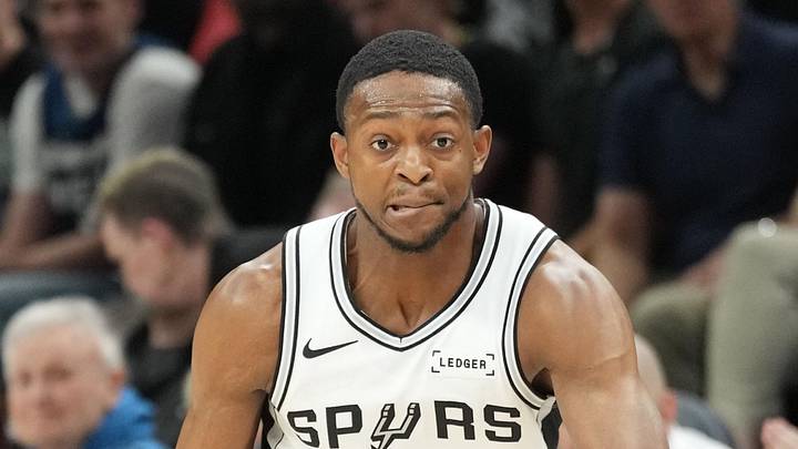 May 15, 2026; Minneapolis, Minnesota, USA; San Antonio Spurs guard De'aaron Fox (4) dribbles the ball against the Minnesota Timberwolves in the first half during game six of the second round of the 2026 NBA Playoffs at Target Center. Mandatory Credit: Jesse Johnson-Imagn Images