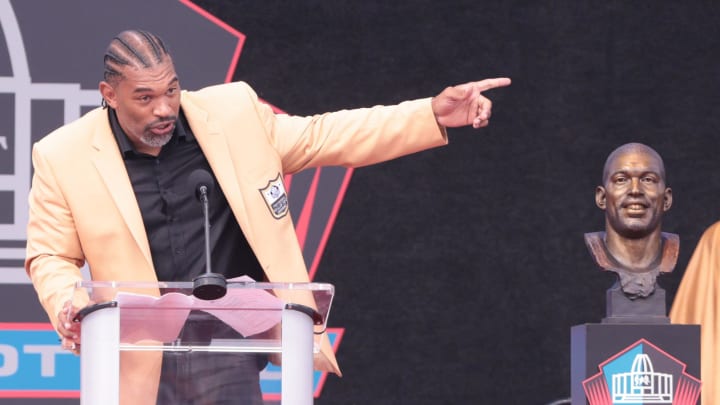 Julius Peppers gives his remarks at the 2024 Pro Football Hall of Fame Enshrinement at Tom Benson Hall of Fame Stadium Saturday, Aug. 3, 2024.