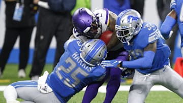 Oct 20, 2019; Detroit, MI, USA; Minnesota Vikings running back Ameer Abdullah (31) gets tackled by Detroit Lions defensive back Will Harris (25) and defensive back Tavon Wilson (32) during the first quarter at Ford Field. Mandatory Credit: Raj Mehta-Imagn Images