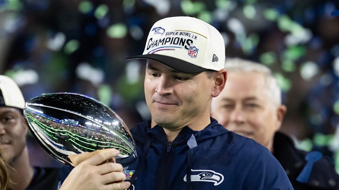 Seattle Seahawks head coach Mike Macdonald celebrates with the Vince Lombardi trophy
