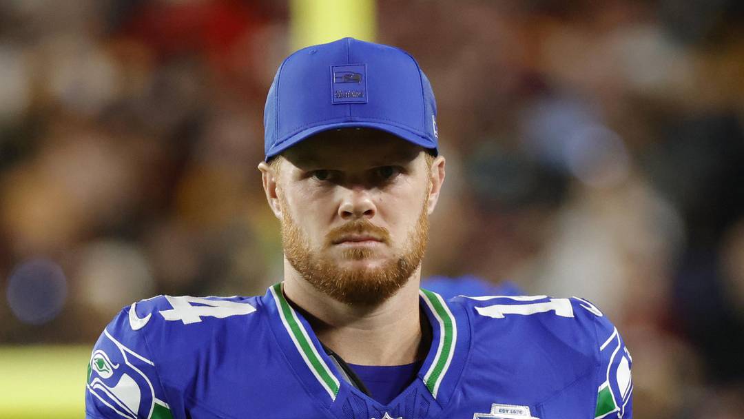 Seattle Seahawks quarterback Sam Darnold looks on during the first half