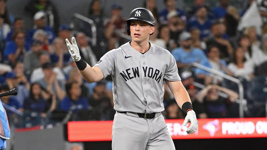 New York Yankees designated hitter Ben Rice (22) reacts after hitting a home run