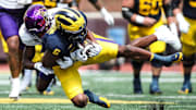 Michigan wide receiver Cornelius Johnson makes a catch against East Carolina defensive back Shavon Revel during the second half of U-M's 30-3 win on Saturday, Sept. 2, 2023, at Michigan Stadium.