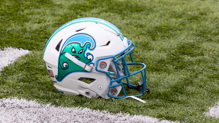 Dec 3, 2022; New Orleans, Louisiana, USA; Tulane Green Wave helmet on the field against the UCF Knights during the first half  at Yulman Stadium. Mandatory Credit: Stephen Lew-USA TODAY Sports