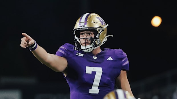 Will Rogers directs his team against Weber State in the opener. 