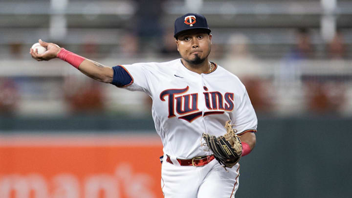 Sep 28, 2022; Minneapolis, Minnesota, USA; Minnesota Twins second baseman Luis Arraez (2) throws to first base for the out during the eighth inning against the Chicago White Sox at Target Field. Mandatory Credit: Jordan Johnson-Imagn Images