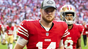 Dec 17, 2023; Glendale, Arizona, USA; San Francisco 49ers quarterback Sam Darnold (14) against the Arizona Cardinals at State Farm Stadium. Mandatory Credit: Mark J. Rebilas-Imagn Images