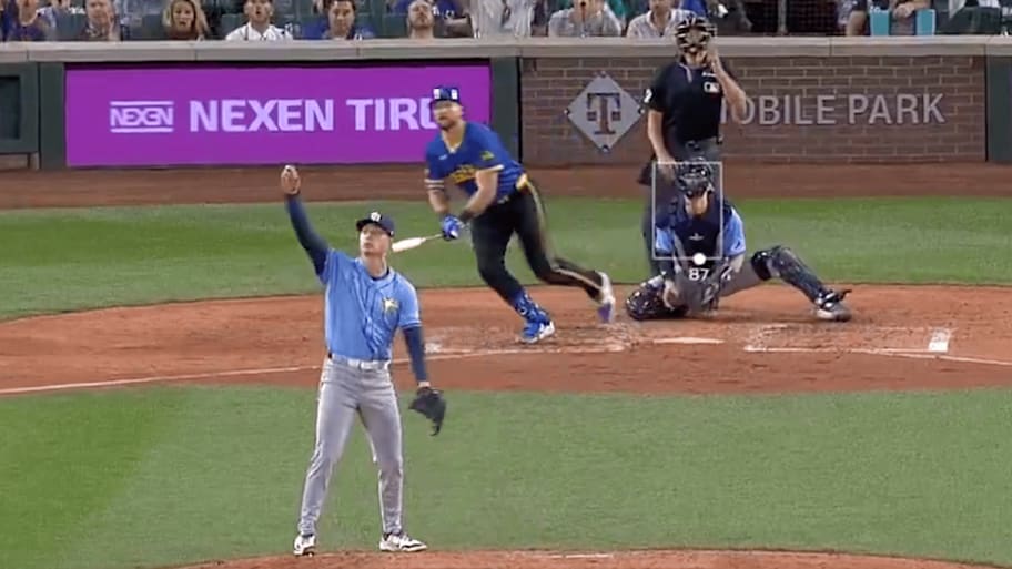 Griffin Jax pointed in the air after the ball sailed off Cal Raleigh's bat | Screengrab via @MLB on X/Twitter
