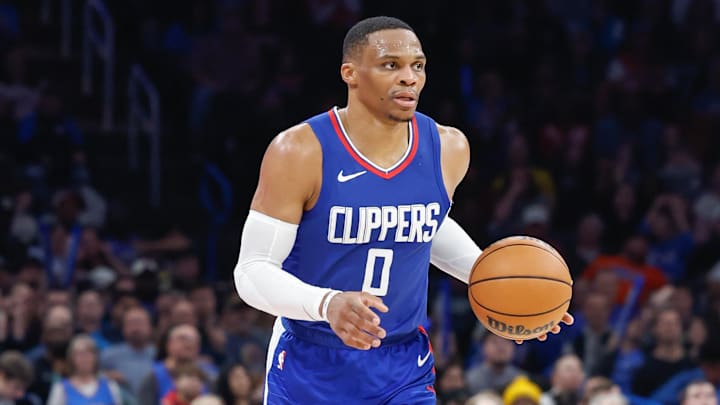 Dec 21, 2023; Oklahoma City, Oklahoma, USA; LA Clippers guard Russell Westbrook (0) dribbles the ball down the court against the Oklahoma City Thunder during the second half at Paycom Center. Mandatory Credit: Alonzo Adams-Imagn Images