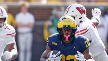 Oct 4, 2025; Ann Arbor, Michigan, USA;  Michigan Wolverines running back Justice Haynes (22) against the Wisconsin Badgers in the second half at Michigan Stadium. Mandatory Credit: Rick Osentoski-Imagn Images