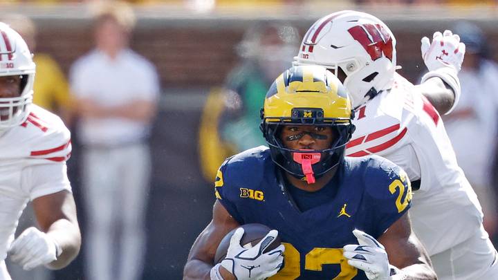 Oct 4, 2025; Ann Arbor, Michigan, USA;  Michigan Wolverines running back Justice Haynes (22) against the Wisconsin Badgers in the second half at Michigan Stadium. Mandatory Credit: Rick Osentoski-Imagn Images