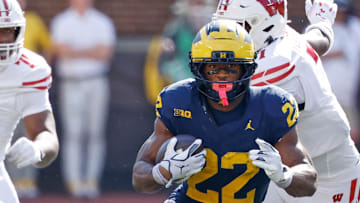 Oct 4, 2025; Ann Arbor, Michigan, USA;  Michigan Wolverines running back Justice Haynes (22) against the Wisconsin Badgers in the second half at Michigan Stadium. Mandatory Credit: Rick Osentoski-Imagn Images