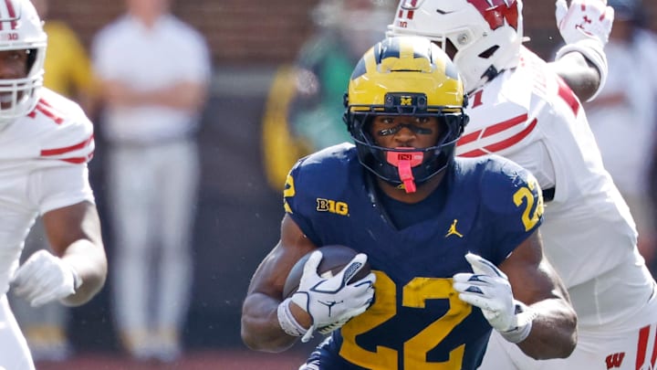 Oct 4, 2025; Ann Arbor, Michigan, USA;  Michigan Wolverines running back Justice Haynes (22) against the Wisconsin Badgers in the second half at Michigan Stadium. Mandatory Credit: Rick Osentoski-Imagn Images