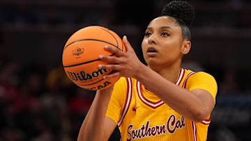 Mar 8, 2025; Indianapolis, IN, USA; South California Trojans guard JuJu Watkins (12) attempts a free throw against Michigan Wolverines during the second half of the Big Ten Conference Tournament semifinals at Gainbridge Fieldhouse.