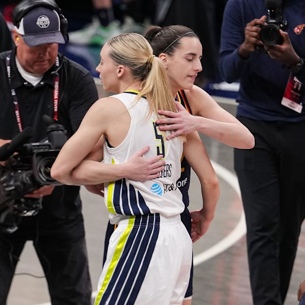 Indiana Fever guard Caitlin Clark (22) and Dallas Wings guard Paige Bueckers 
