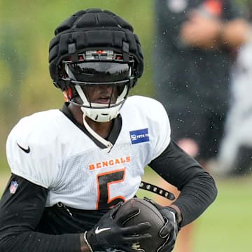 Cincinnati Bengals wide receiver Tee Higgins (5) catches a pass at the Chicago Bears Halas Hall practice facility in Lake Forest, Ill., on Thursday, Aug. 15, 2024.