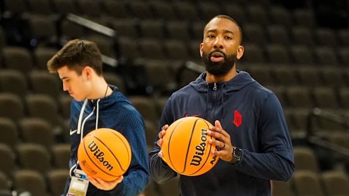 Mar 20, 2024; Omaha, NE, USA; Duquesne Dukes assistant coach Dru Joyce III talks to players during the NCAA first round practice session at CHI Health Center Omaha. Mandatory Credit: Dylan Widger-Imagn Images
