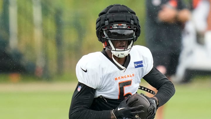 Cincinnati Bengals wide receiver Tee Higgins (5) catches a pass at the Chicago Bears Halas Hall practice facility in Lake Forest, Ill., on Thursday, Aug. 15, 2024.